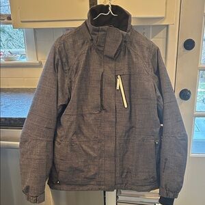 Women’s Sunice ski jacket, size 12.